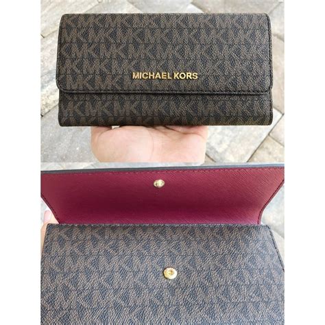 michael kors trifold wallet brown|Michael Kors large trifold wallet.